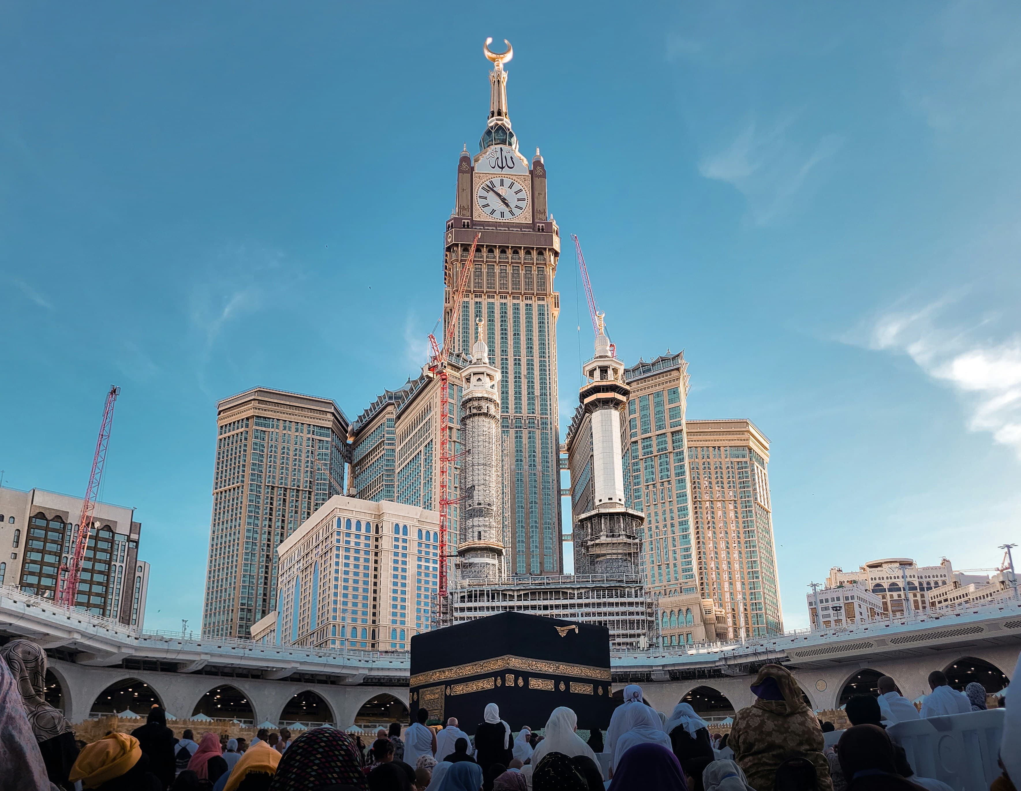 Pilgrims walking near the Holy Mosque during the Hajj season